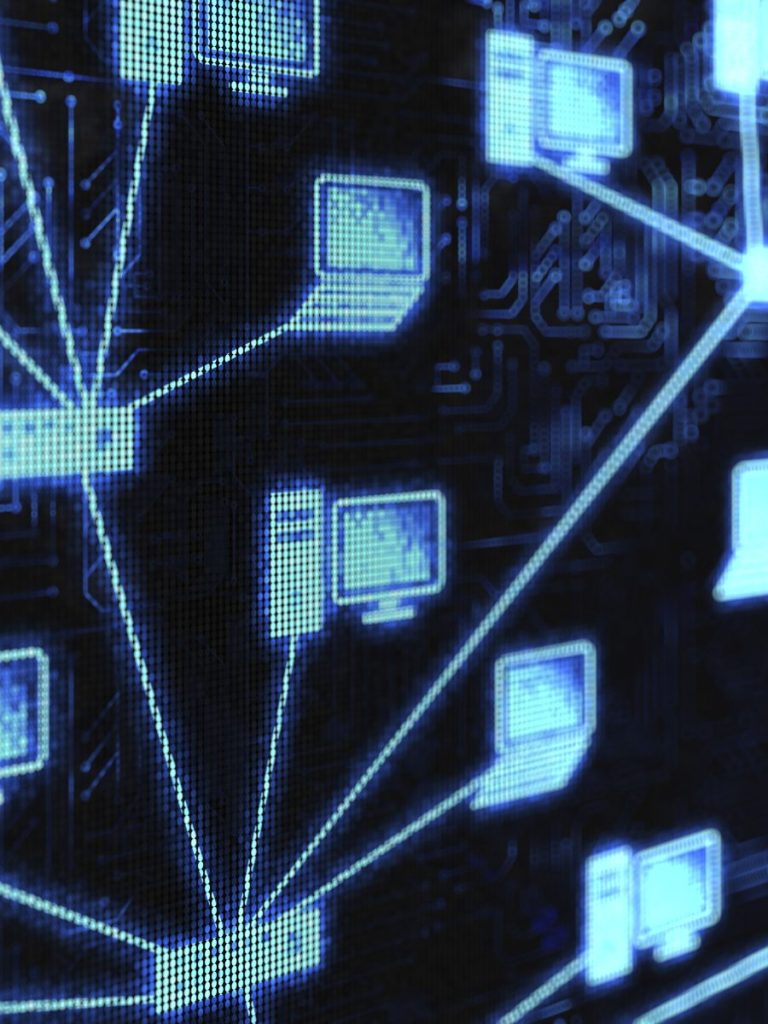 Network of blue computer icons connected by lines on a dark background.